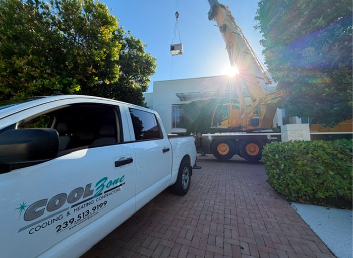 Cool Zone service truck and crane at a Naples install